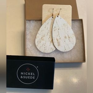 Brand new, in box. Featherweight teardrop earrings.